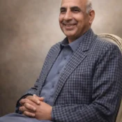 Who is the owner of Faisal Town Islamabad?