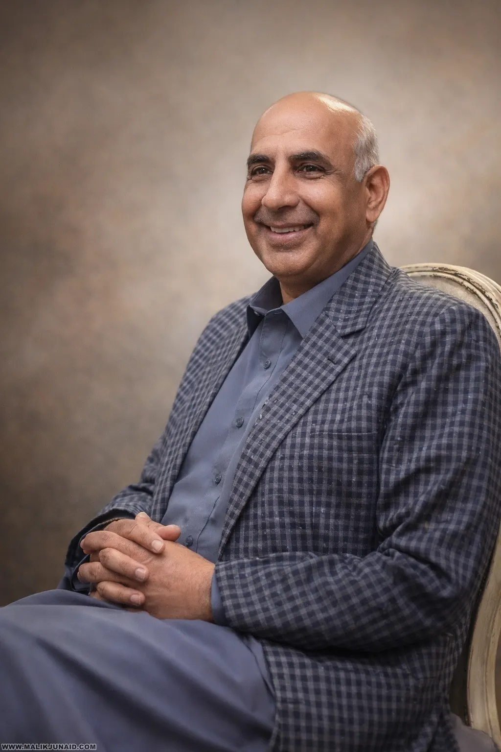 Who is the owner of Faisal Town Islamabad?