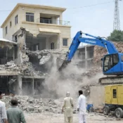 demolition of house at phase 7 ghauri town